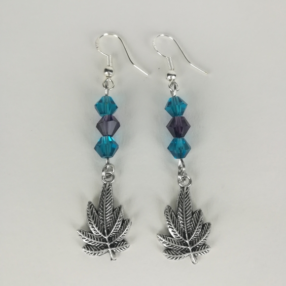 Hand Crafted Jewelry - Simple cannabis leaf earrings blue-green & purple faceted glass beads